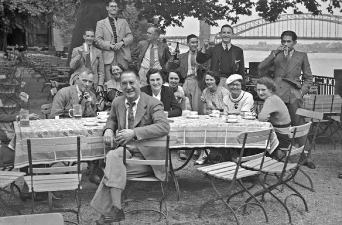Framed Print : People sitting at a table in the open air Framed Print : People sitting at a table in the open air