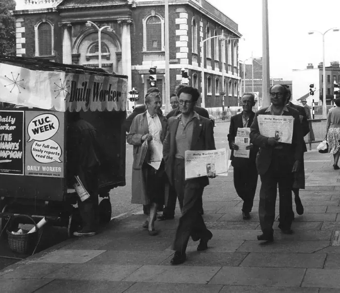 Framed Print : People on street with Daily Worker newspaper, London Framed Print : People on street with Daily Worker newspaper, London