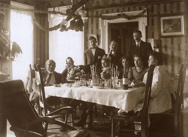 People at a table for a Christmas meal, USA