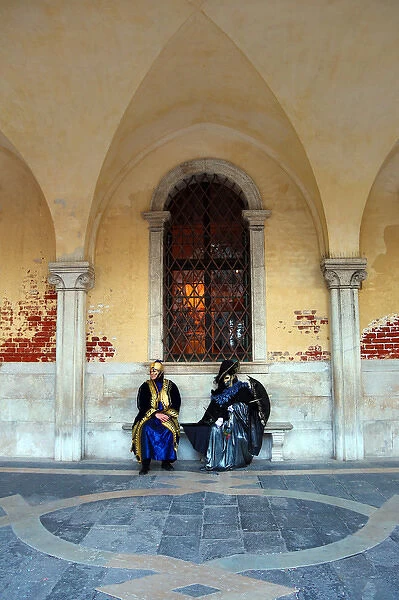 People wearing Venice Carnival Costumes