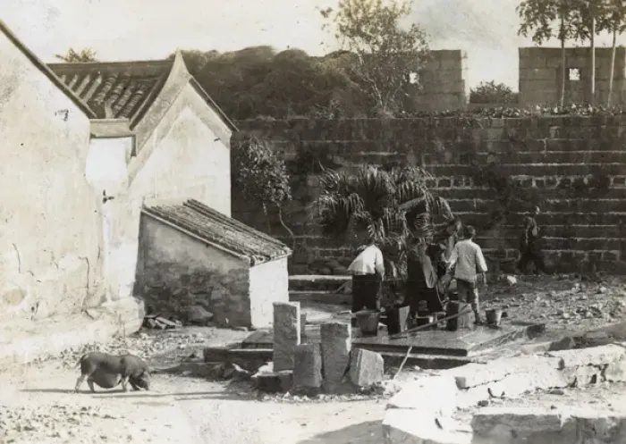 Framed Print : People working in a back yard, China Framed Print : People working in a back yard, China