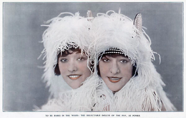 Photograph of the dolly sisters in fluffy white costumes for their Pony Trot