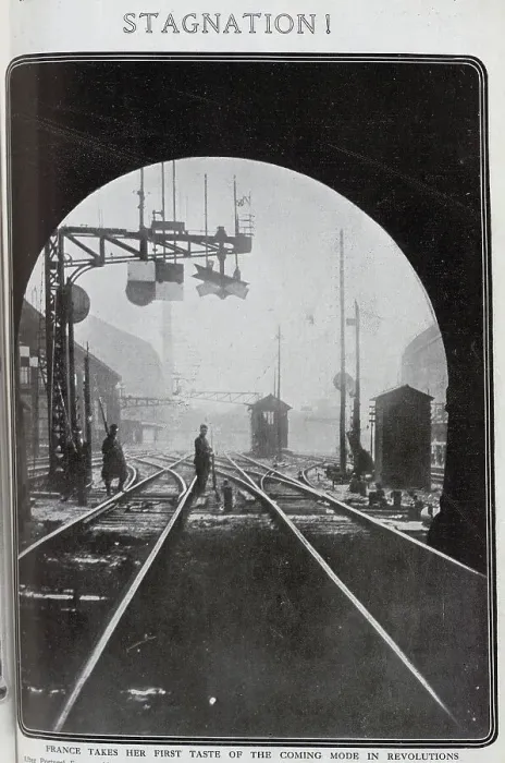 Framed Print : Photograph of rail strike in France, with soldier and striking worker with rifles and bayonets, on railway line by signals, at the exit from a tunnel. Captioned, Stagnation Framed Print : Photograph of rail strike in France, with soldier and striking worker with rifles and bayonets, on railway line by signals, at the exit from a tunnel. Captioned, Stagnation