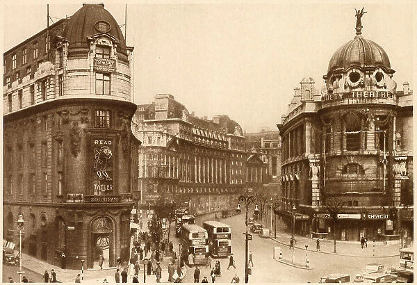 Photograph taken by the corner of the Strand and the Aldwych. Showing Inveresk House, (on the left), formerly known as Borthwick House when it held the offices of the Morning Post, became, in 1928