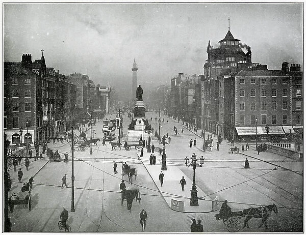 Photograph taken from O'connell Bridge looking towards O'connell Statue and beyond Nelson's Pillar. Date: late 1890s
