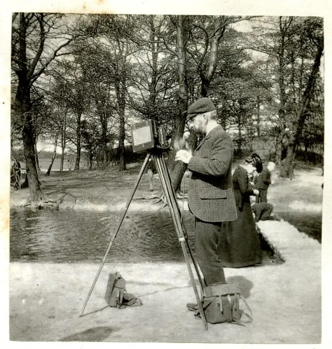 Framed Print : Photographer with camera and tripod Framed Print : Photographer with camera and tripod