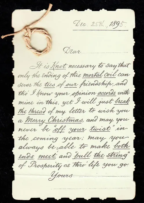Framed Print : Piece of string with comic letter on a Christmas card Framed Print : Piece of string with comic letter on a Christmas card