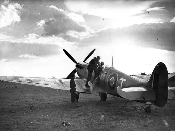 Framed Print : A pilot is about to climb into his Supermarine Spitfire IX Framed Print : A pilot is about to climb into his Supermarine Spitfire IX