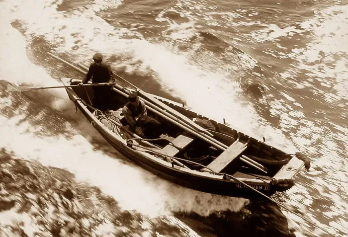 Framed Print : A Pilot cobble being towed by a ship in 1907 Framed Print : A Pilot cobble being towed by a ship in 1907