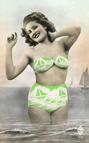 Pin-up girl on postcard in lime green nautical bikini