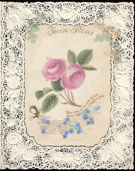 Pink and blue flowers on a paper lace romantic card