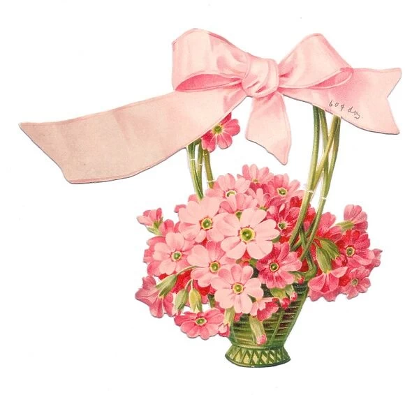 Pink flowers in a basket on a cutout greetings card