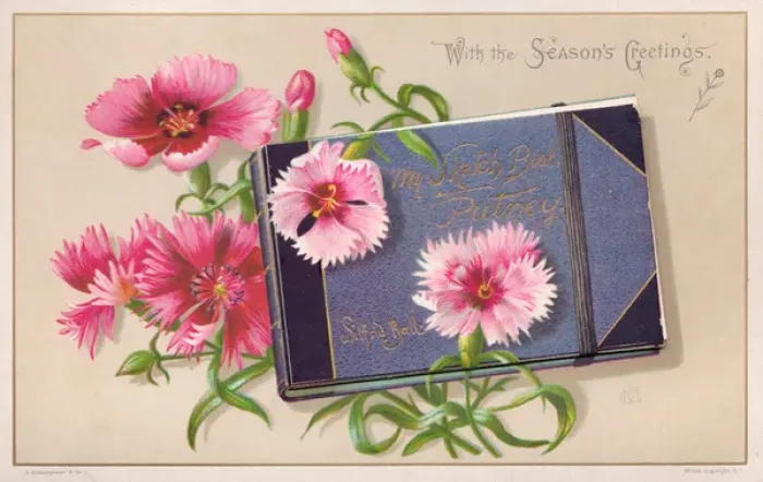 Framed Print : Pink flowers and sketch book on a Christmas card Framed Print : Pink flowers and sketch book on a Christmas card