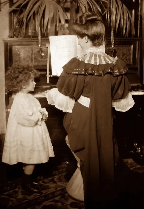 Framed Print : Playing the piano in an Edwardian parlour - early 1900s Framed Print : Playing the piano in an Edwardian parlour - early 1900s