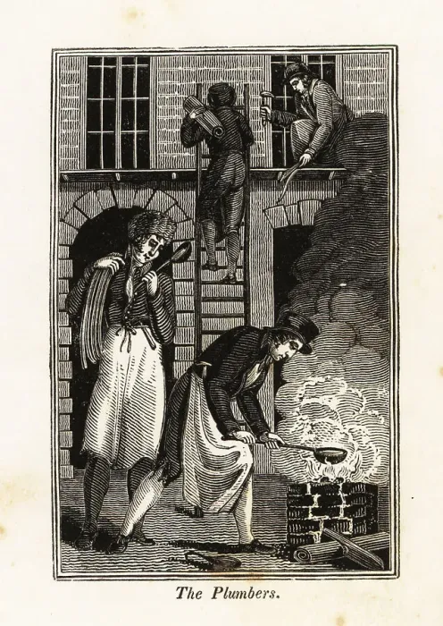 Framed Print : Plumbers fixing lead pipes on a building site Framed Print : Plumbers fixing lead pipes on a building site