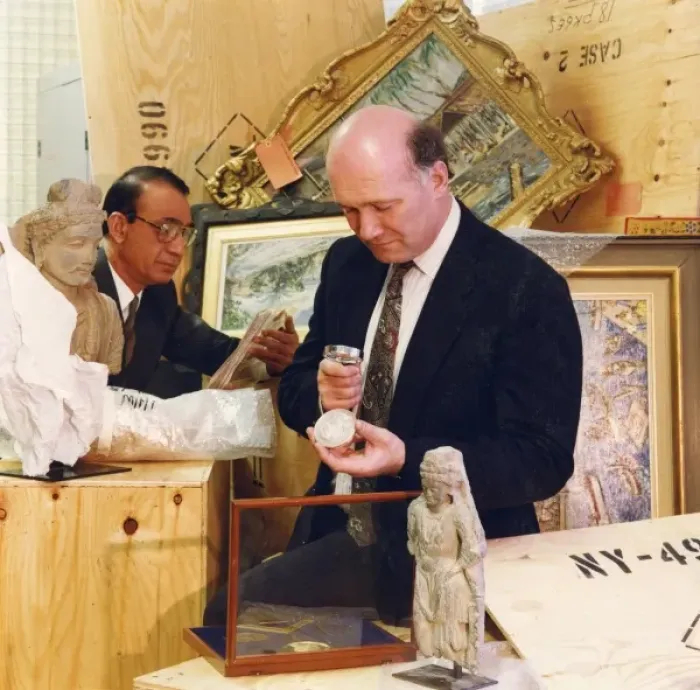 Framed Print : Police experts examine stolen property Framed Print : Police experts examine stolen property