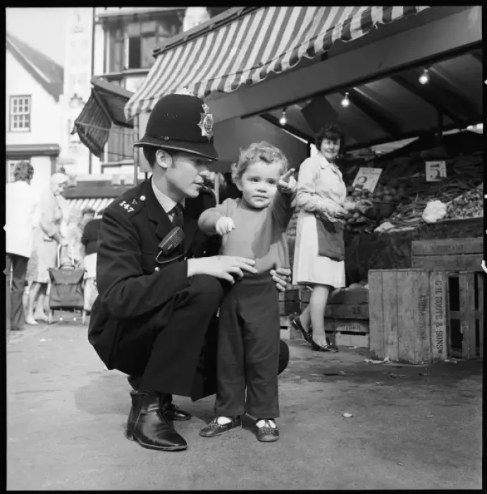 Framed Print : Police Officer & Child Framed Print : Police Officer & Child