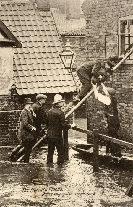 Framed Print : Police rescue a small boy during the Floods in Norwich Framed Print : Police rescue a small boy during the Floods in Norwich