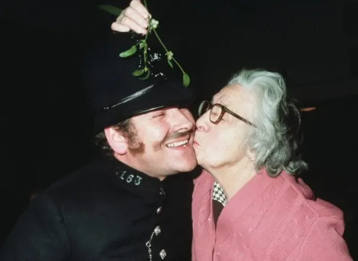 Framed Print : Policeman with enthusiastic granny Framed Print : Policeman with enthusiastic granny