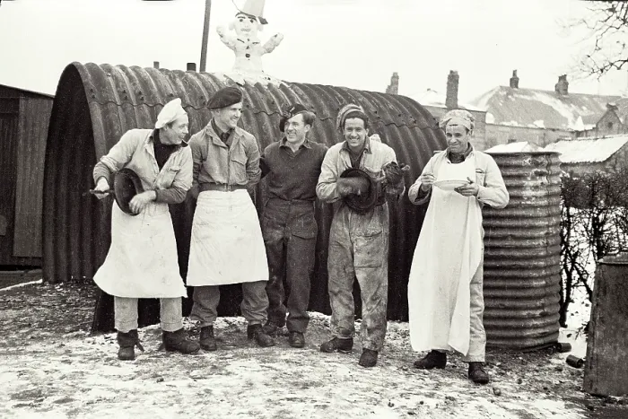 Framed Print : Five Polish soldiers, including cooks at the Helmsley Polish Resettlement Camp, next to a Nissen Hut Date: 1947 - 1948 Framed Print : Five Polish soldiers, including cooks at the Helmsley Polish Resettlement Camp, next to a Nissen Hut Date: 1947 - 1948