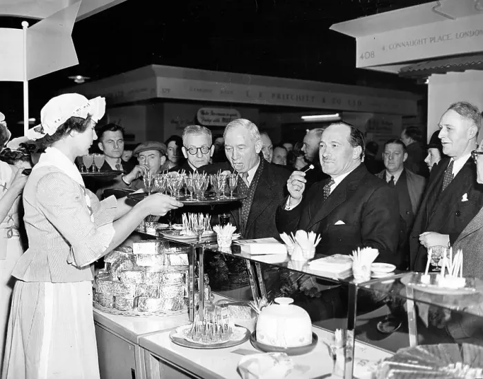 Framed Print : Politicians and dignitaries enjoying the samples at a food e Framed Print : Politicians and dignitaries enjoying the samples at a food e