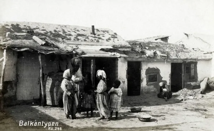 Framed Print : A poor Balkan Family outside their home Framed Print : A poor Balkan Family outside their home