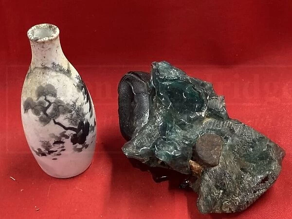 Porcelain vase and molten glass bottle from Hiroshima, Japan
