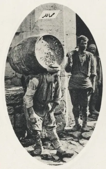Framed Print : Porter carrying a heavy load Framed Print : Porter carrying a heavy load