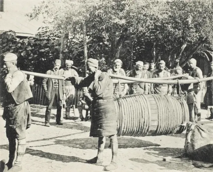 Framed Print : Porters carrying a large barrel on two long yolks Framed Print : Porters carrying a large barrel on two long yolks