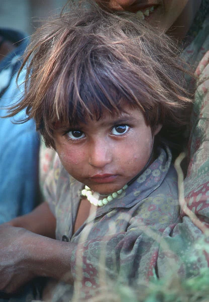 Portrait of Kashmiri child with brown eyes