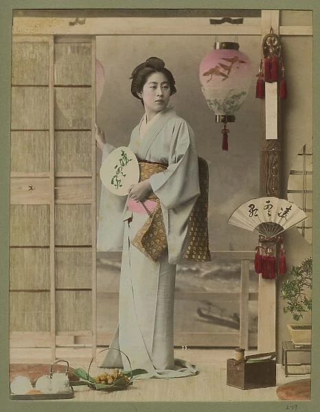 Portrait of lady in kimono with fan