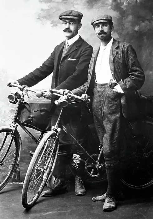 Framed Print : Portrait studio photo of cyclists, early 1900s Framed Print : Portrait studio photo of cyclists, early 1900s