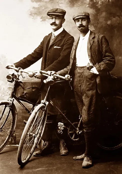 Framed Print : Portrait studio photo of cyclists, early 1900s Framed Print : Portrait studio photo of cyclists, early 1900s