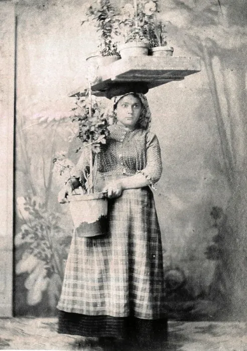 Framed Print : Portuguese woman flower seller, Lisbon, Portugal
