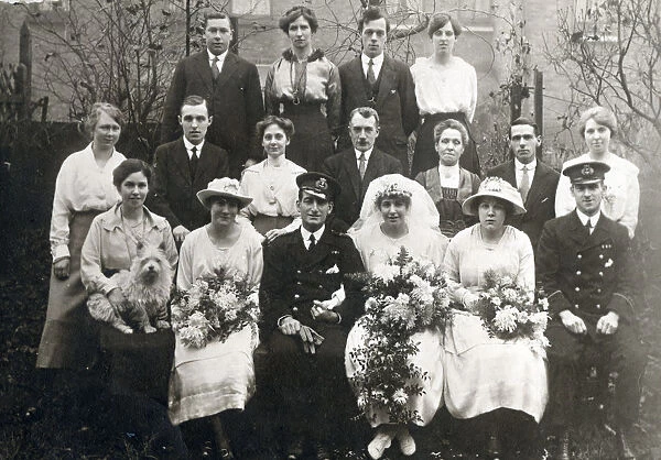 A post WW1 group weddig photograph, taken in a suburban back garden. Date: 1919