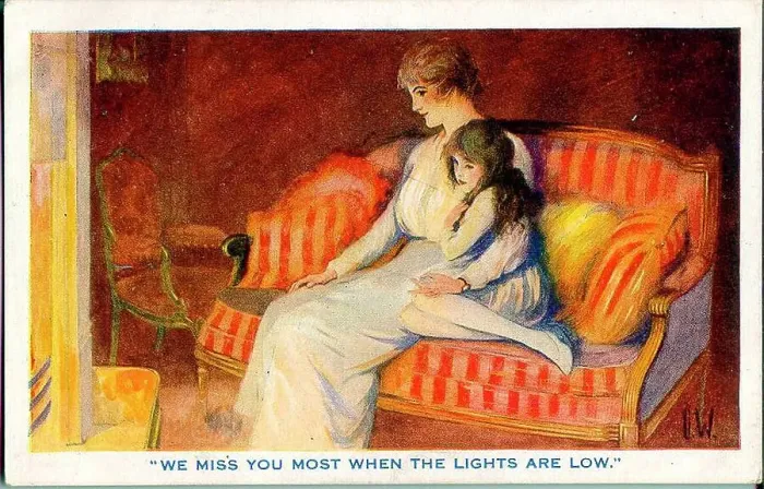 Framed Print : Postcard, Mother and daughter at home - We miss you most when the lights are low. Date: 1914-1918 Framed Print : Postcard, Mother and daughter at home - We miss you most when the lights are low. Date: 1914-1918