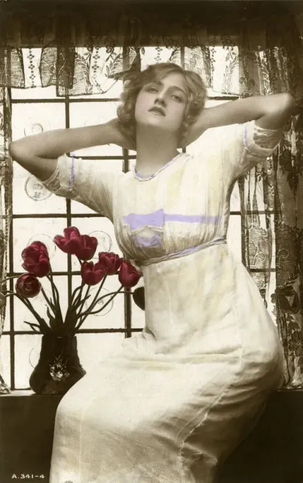 Framed Print : Postcard, young woman with vase of tulips Framed Print : Postcard, young woman with vase of tulips