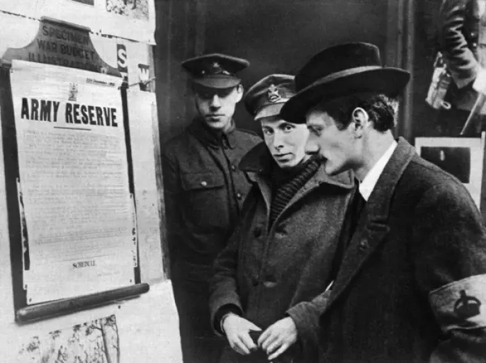 Framed Print : Potential army recruit looks at the proclamation Framed Print : Potential army recruit looks at the proclamation