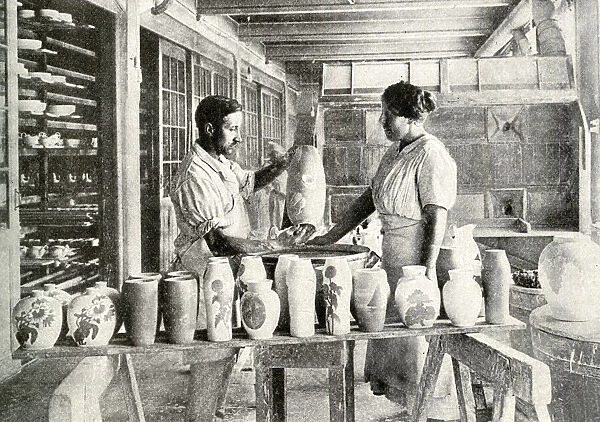 Potters dipping porcelain vases, Copenhagen, Denmark