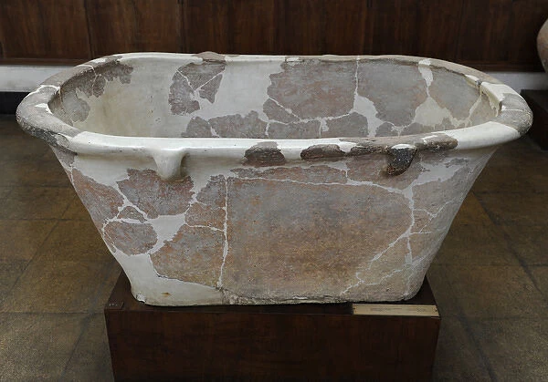 Pottery bath with four loop handles used probably as a coffi