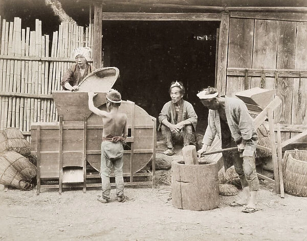 Pounding rice - the last cleaning using fans, Japan