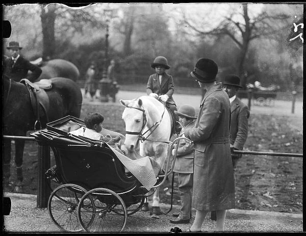 Pram in Rotten Row. A fashionable young mother, 