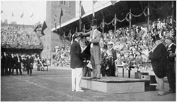 Presentation of medals to the 100 metre men. Date: 1912
