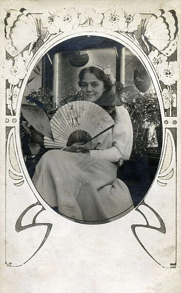 Pretty young girl holding a Stowers promotional fan