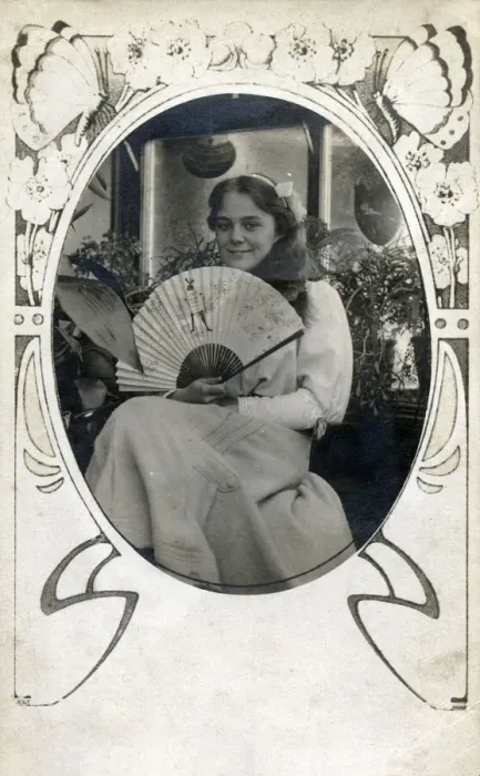 Framed Print : Pretty young girl holding a Stowers promotional fan Framed Print : Pretty young girl holding a Stowers promotional fan