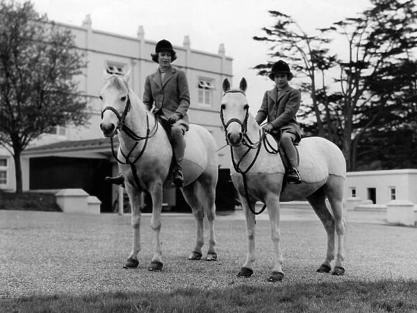 Princess Elizabeth and Margaret riding