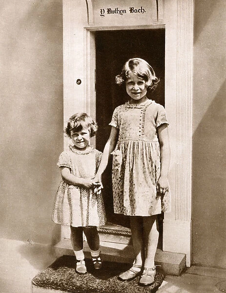 Princesses Elizabeth & Margaret outside their playhouse