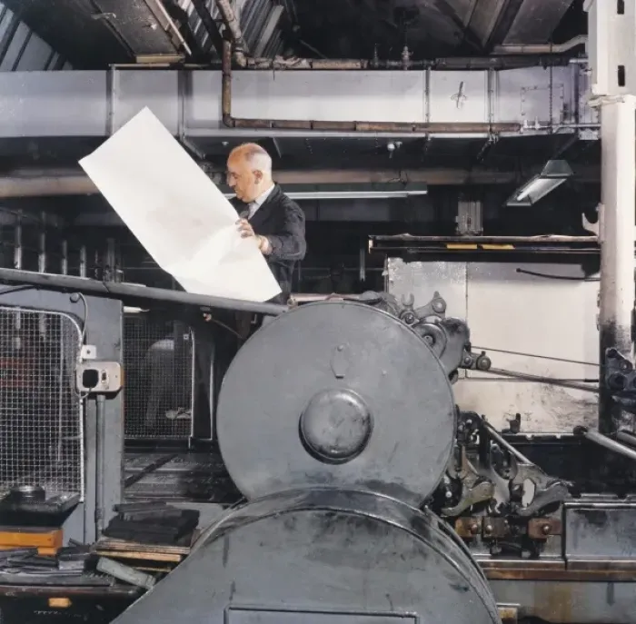 Framed Print : A printer checking a large proof Framed Print : A printer checking a large proof