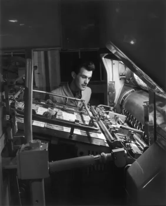 Framed Print : Printing Machine Operator checks a proof Framed Print : Printing Machine Operator checks a proof