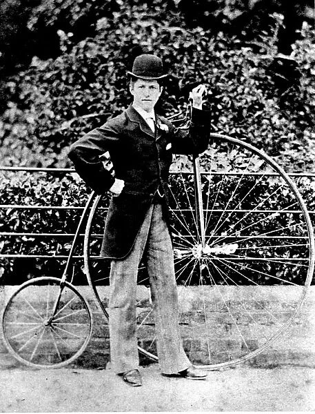 Proud owner and his penny farthing bicycle